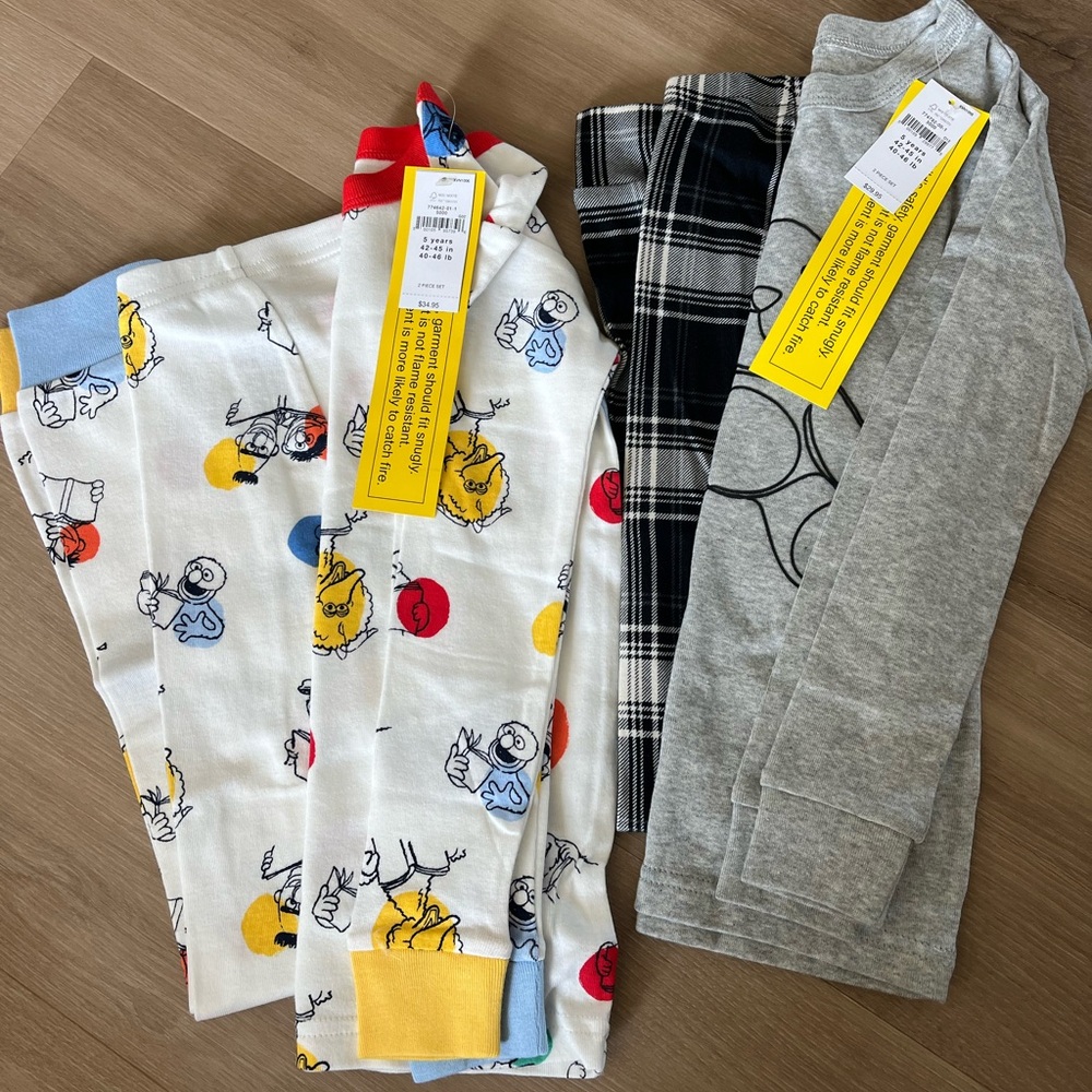 Size 5 years, two sets of pajamas from BabyGap!